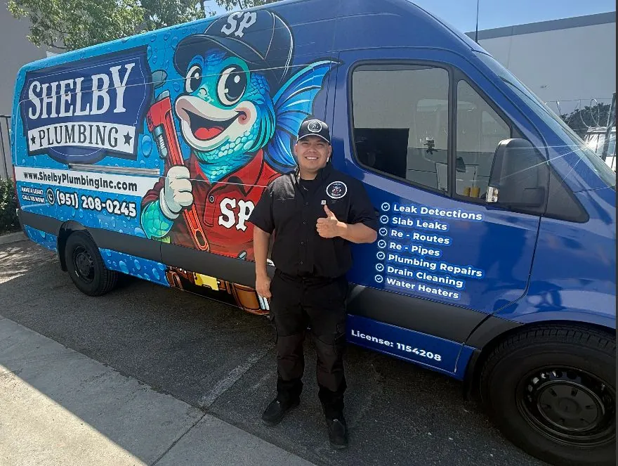 The Shelby Plumbing crew with the company van
